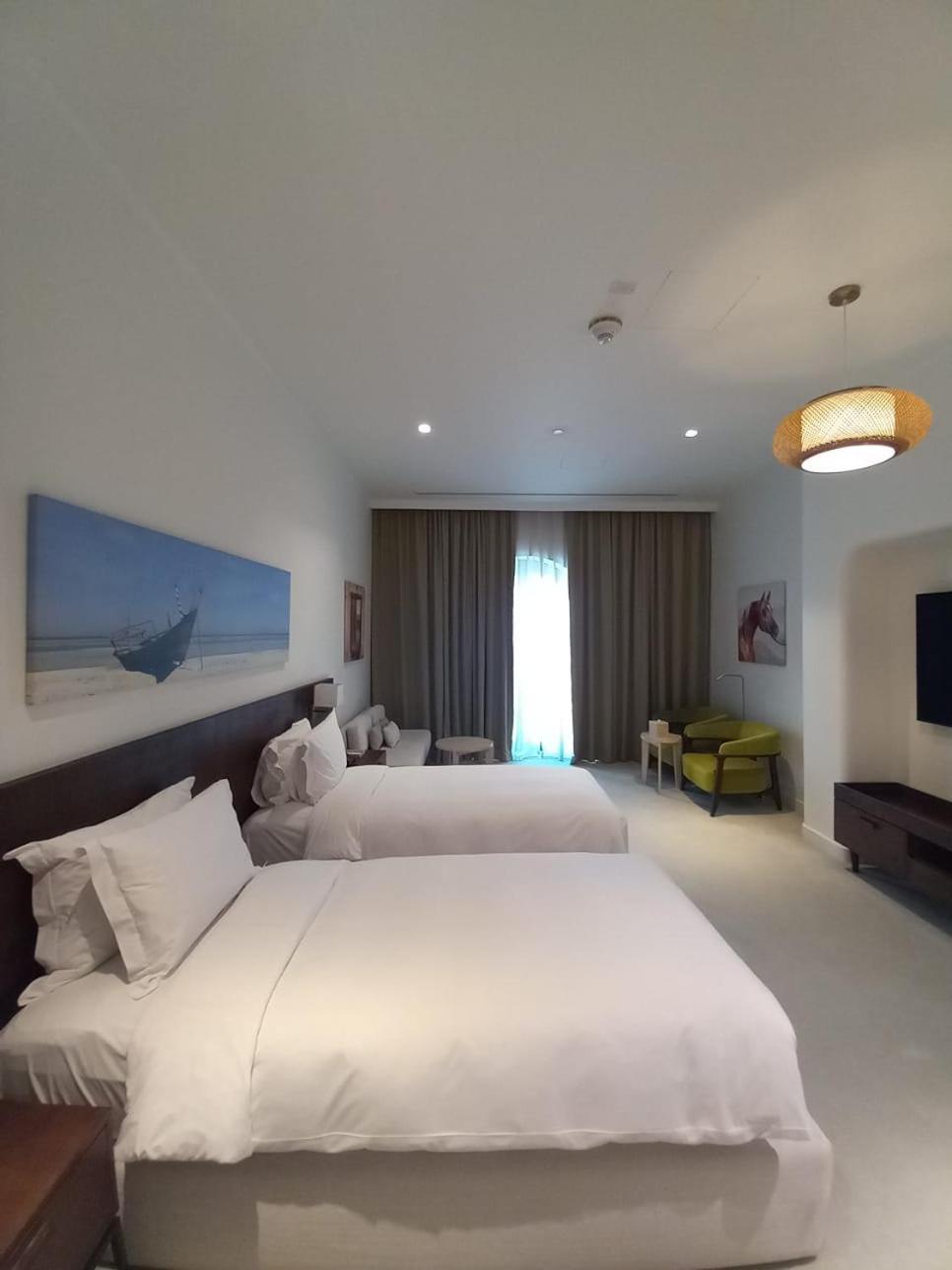 Mina Hotel And Residences By The Torch ドーハ エクステリア 写真 A room at the hotel