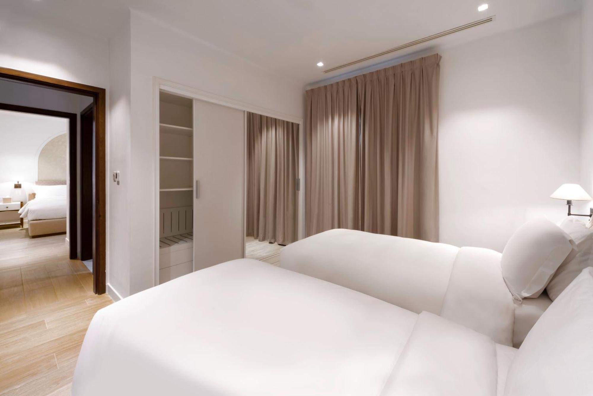 Mina Hotel And Residences By The Torch ドーハ エクステリア 写真 A bedroom at the hotel