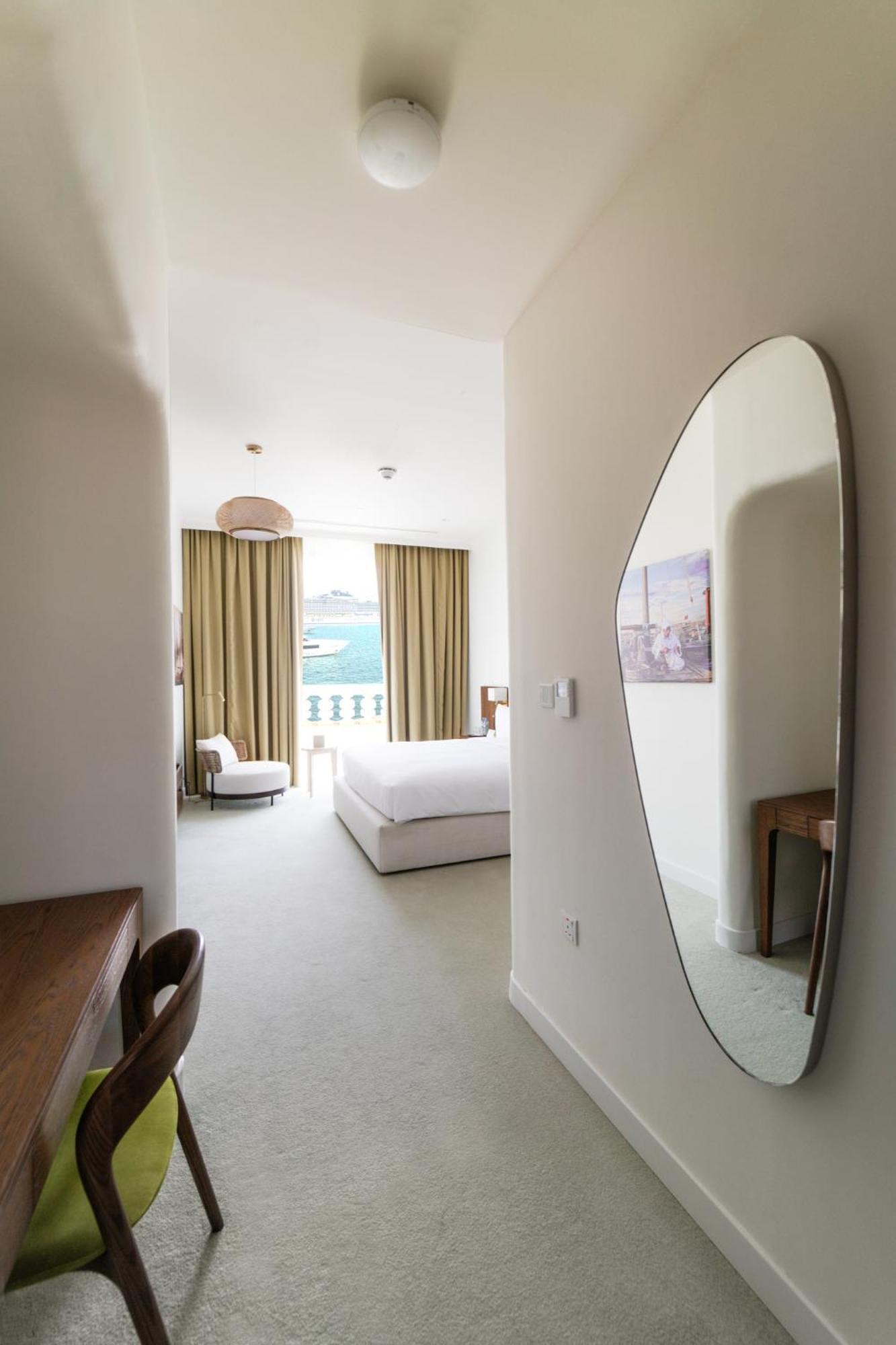 Mina Hotel And Residences By The Torch ドーハ エクステリア 写真 A bedroom at the hotel