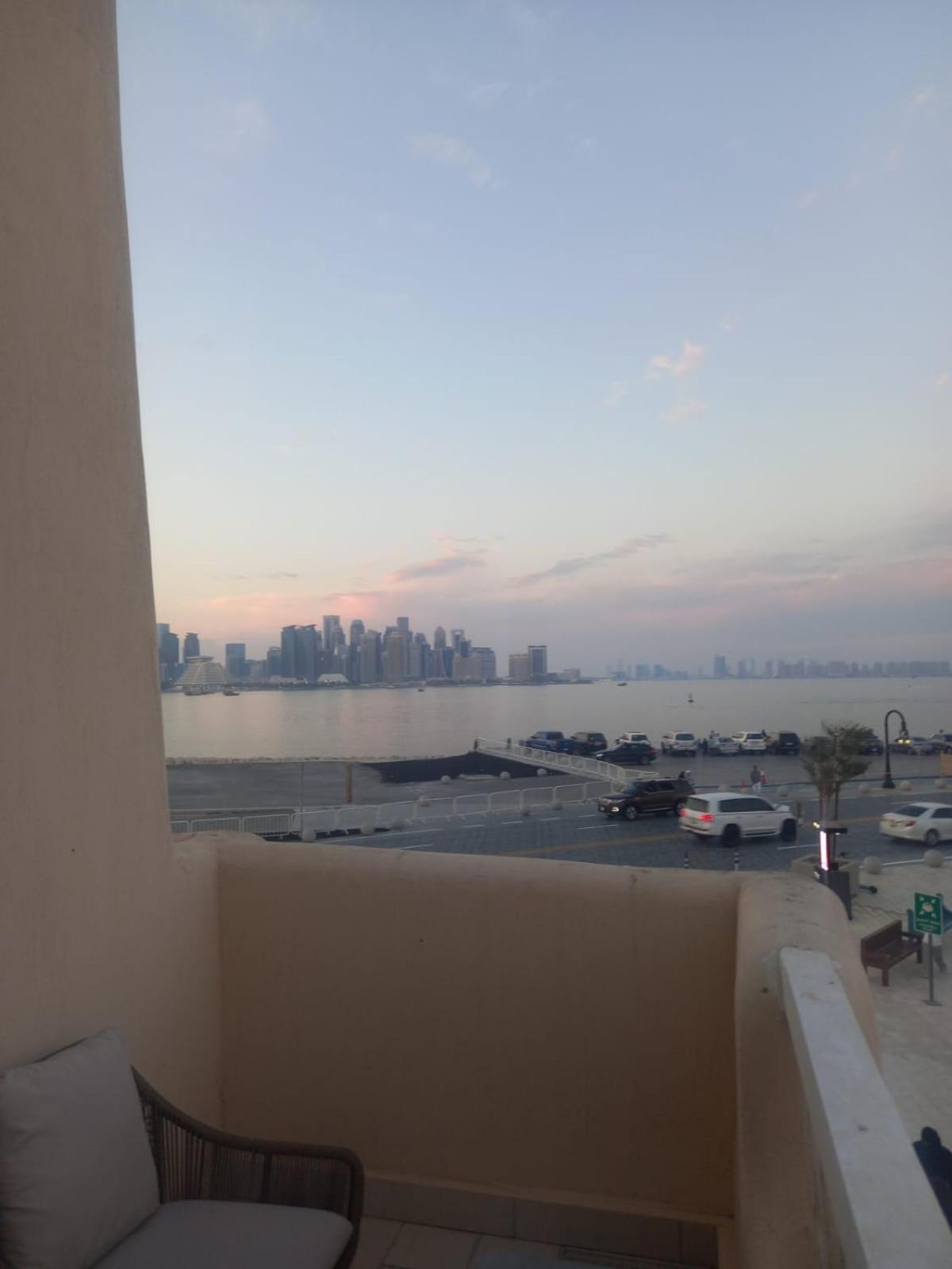 Mina Hotel And Residences By The Torch ドーハ エクステリア 写真 View of Manama skyline from a residential area in Saar