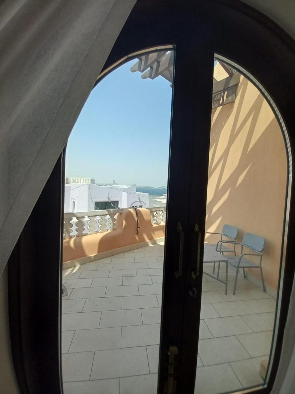 Mina Hotel And Residences By The Torch ドーハ エクステリア 写真 A view from the balcony of a suite at the hotel